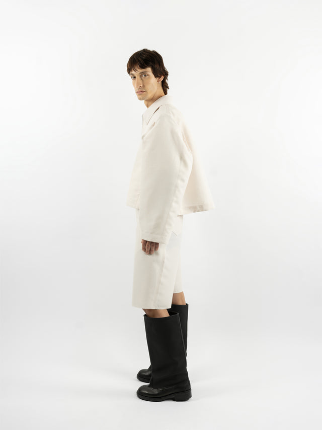 White jacket with structured sleeves