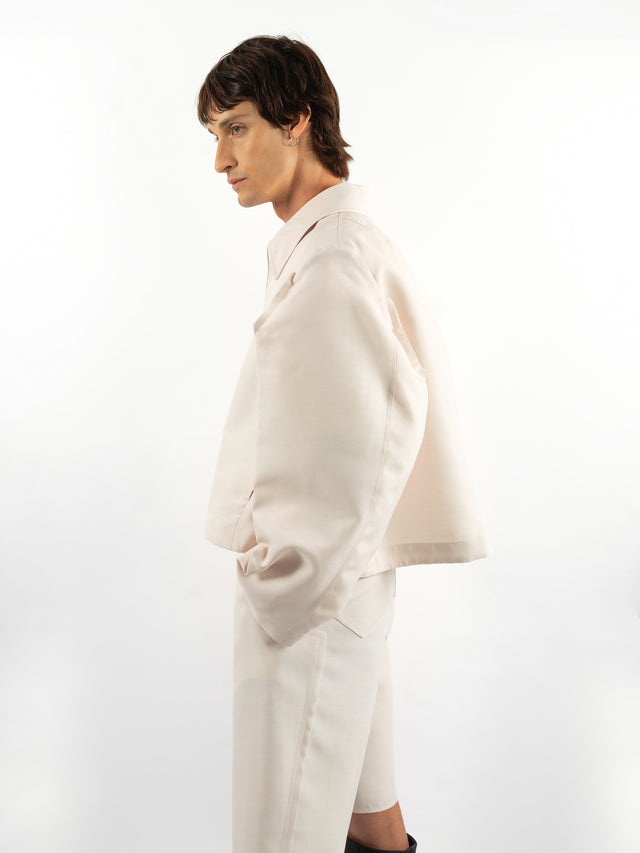 White jacket with structured sleeves
